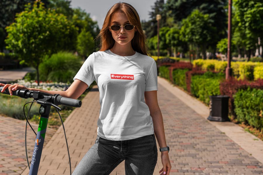 Woman-Wearing-Unisex-T-Shirt-White-'Logo'-Everything-Lisfetstyle-Pictures